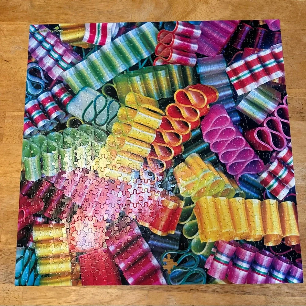 CEACO 549pc Holiday Sweets ribbon candy jigsaw puzzle.